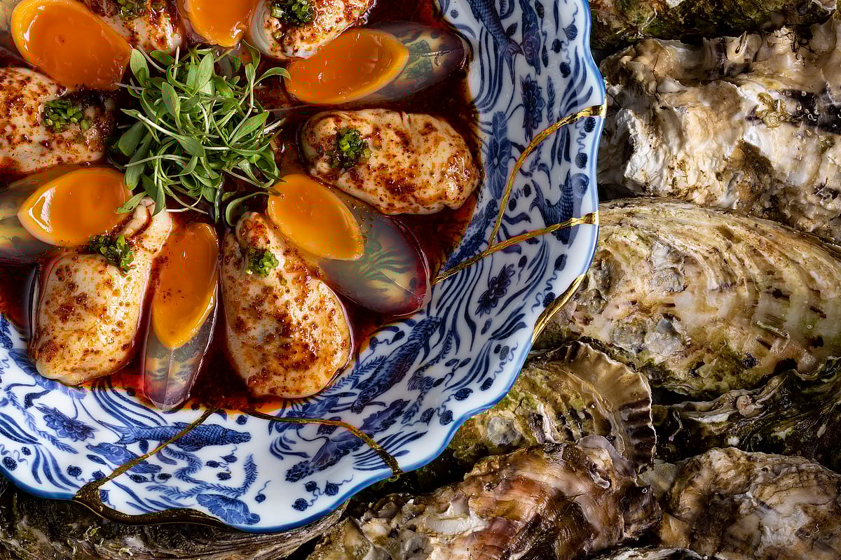 Chilli Japanese oyster and golden crystal egg that was drunken in chilli mala sauce